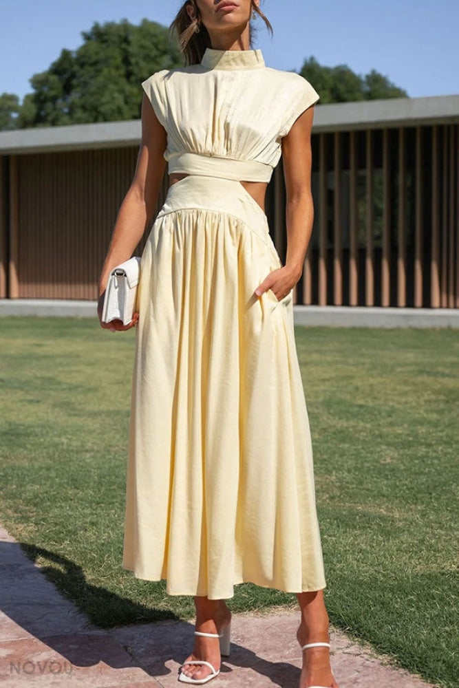 Black elegant roll neck midi dress, waist cut-out, sleeveless, ideal for sophisticated parties.