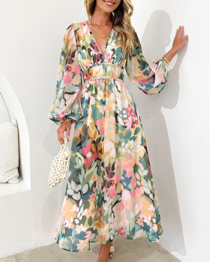 Women's A-line romantic floral midi dress with puff sleeves & V-neck, ideal for summer occasions & wedding guests.
