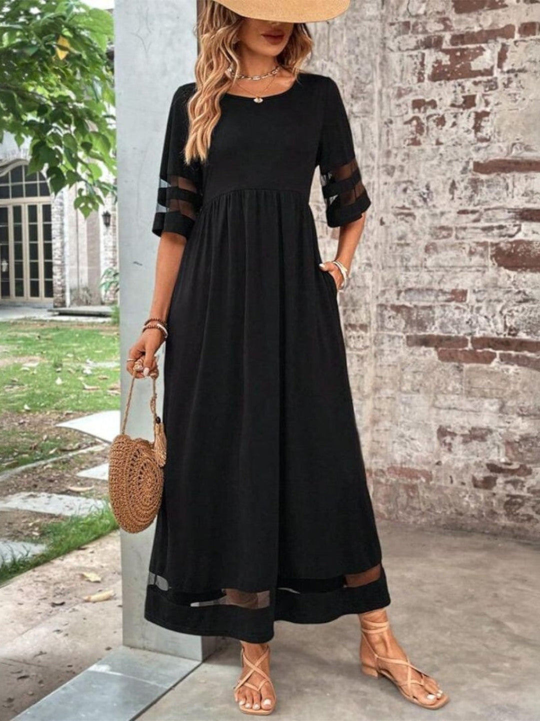 Elegant women's round neck maxi dress with short sleeves, flowing silhouette & gathered waist. Versatile for day or evening.