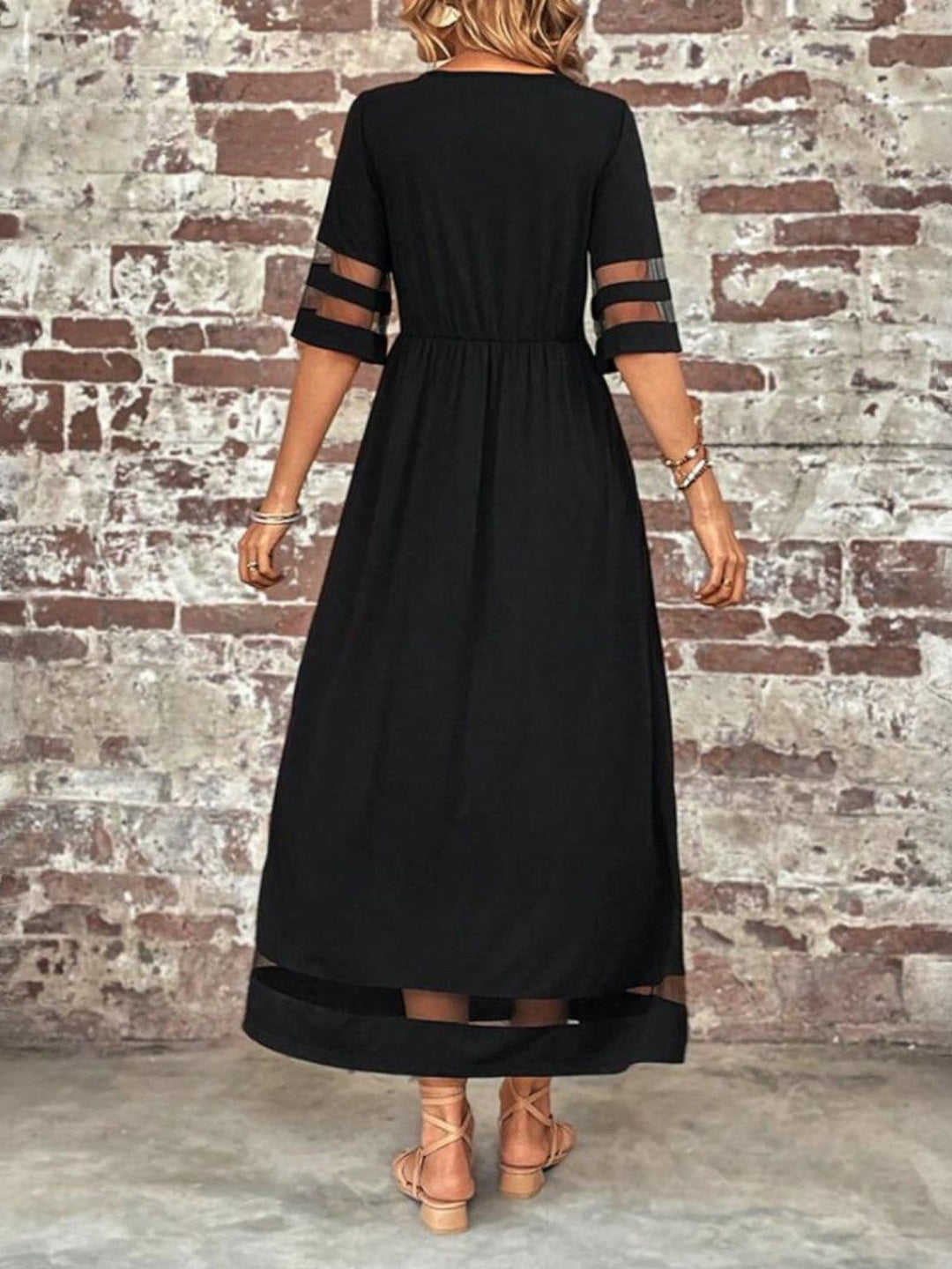 Versatile women's round neck maxi dress with short sleeves. Elegant, flowing design & gathered waist for a flattering fit.