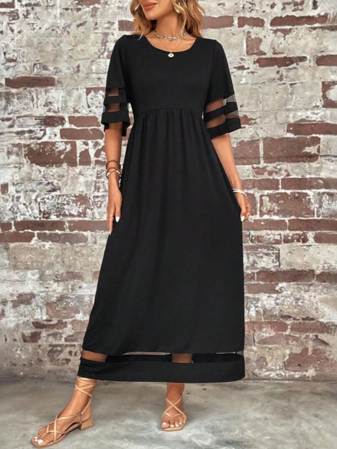 Elegant women's round neck maxi dress with short sleeves. Flattering, flowing style; perfect for day or evening events.