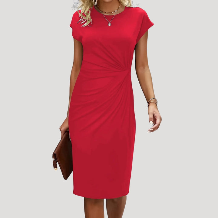 Professional women's midi dress with a round neck and cap sleeves, ideal for office wear and business meetings.