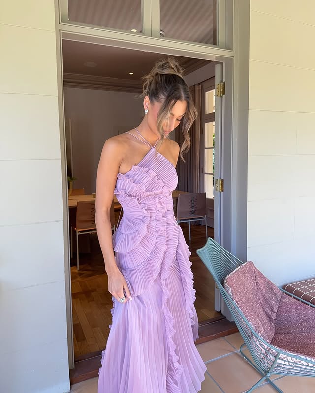 Flowy Women's Ruffle Halter Maxi Dress. Beautiful for wedding guests, evening wear, and elegant formal occasions.