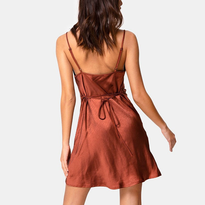 Elegant cowl neck detail on a women's satin mini slip dress, fashionable and chic