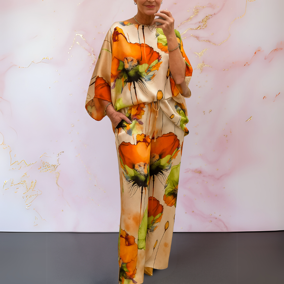 Model wearing an elegant women's satin two-piece set. Luxurious matching co-ord for versatile sophisticated style.