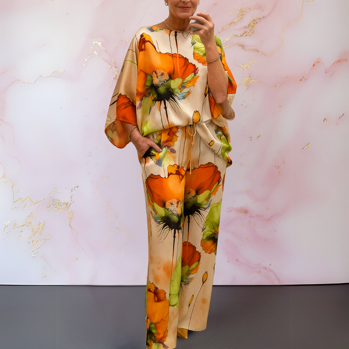 Model wearing an elegant women's satin two-piece set. Luxurious matching co-ord for versatile sophisticated style.