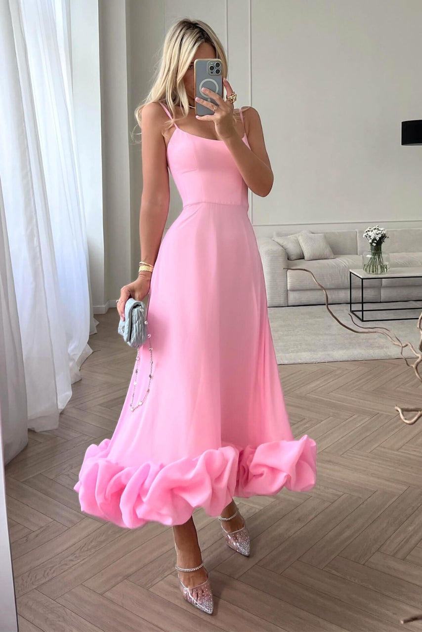 Chic scoop-neck maxi dress for women, featuring spaghetti straps and a flowing ruffle hem, perfect for formal events.