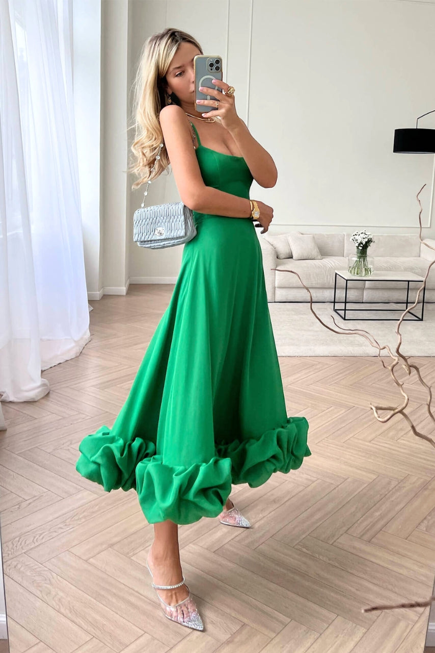 Comfortable & chic women's long evening dress, scoop neck, spaghetti straps & ruffle hem for special occasions.