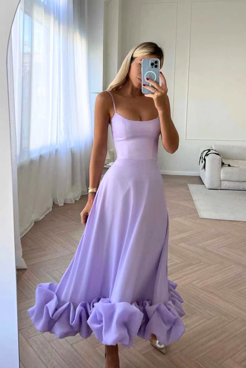 Beautiful women's wedding guest maxi dress, scoop neck design with delicate spaghetti straps and ruffle hem.