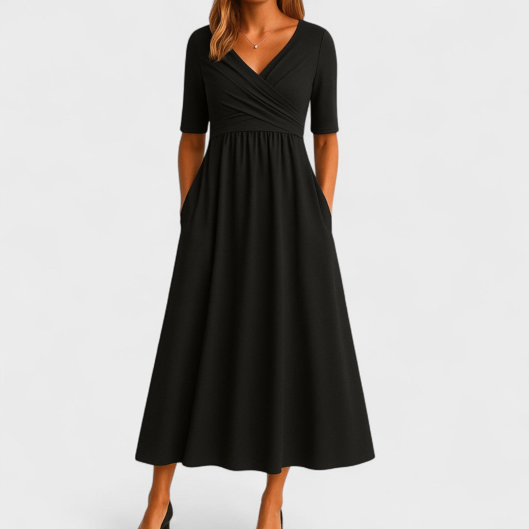 Close-up of elegant women's A-line wrap midi dress fabric, showcasing quality and subtle texture.