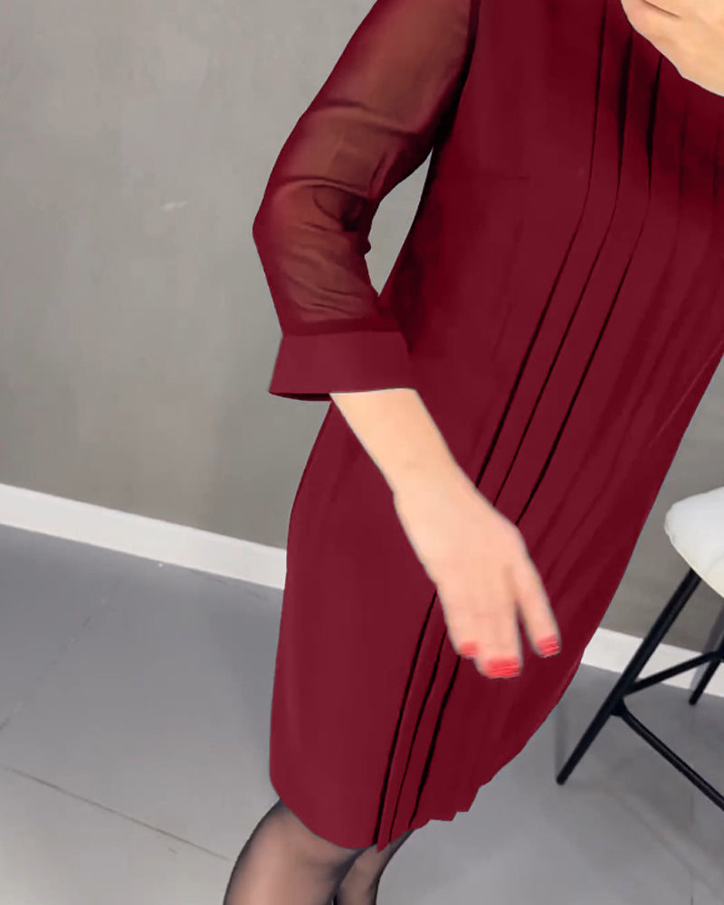 Fashionable women's shift dress, mesh detailed, long sleeve, elegant and perfect for versatile styling.