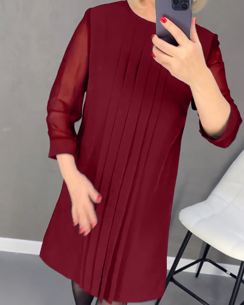 Chic women's Gabrielle dress: elegant shift, mesh details, long sleeves, ideal for modern fashion.