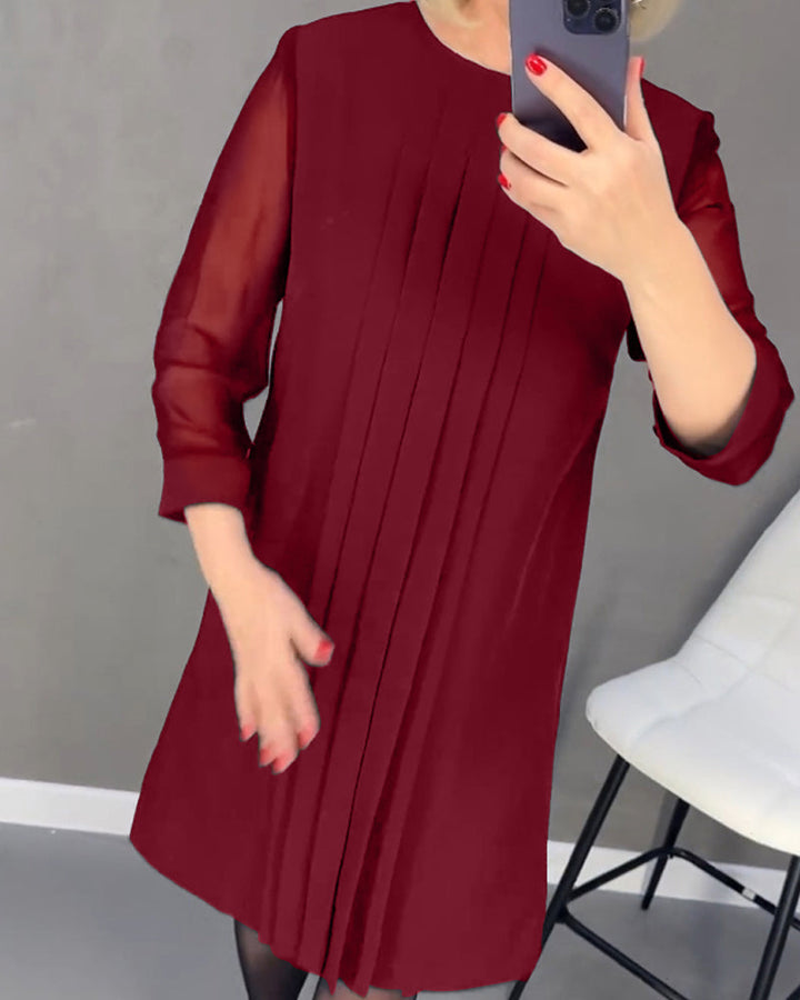 Chic women's Gabrielle dress: elegant shift, mesh details, long sleeves, ideal for modern fashion.