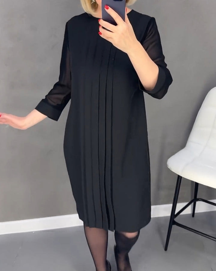 Stylish women's elegant shift dress, Gabrielle design, with chic mesh details, perfect for any occasion.