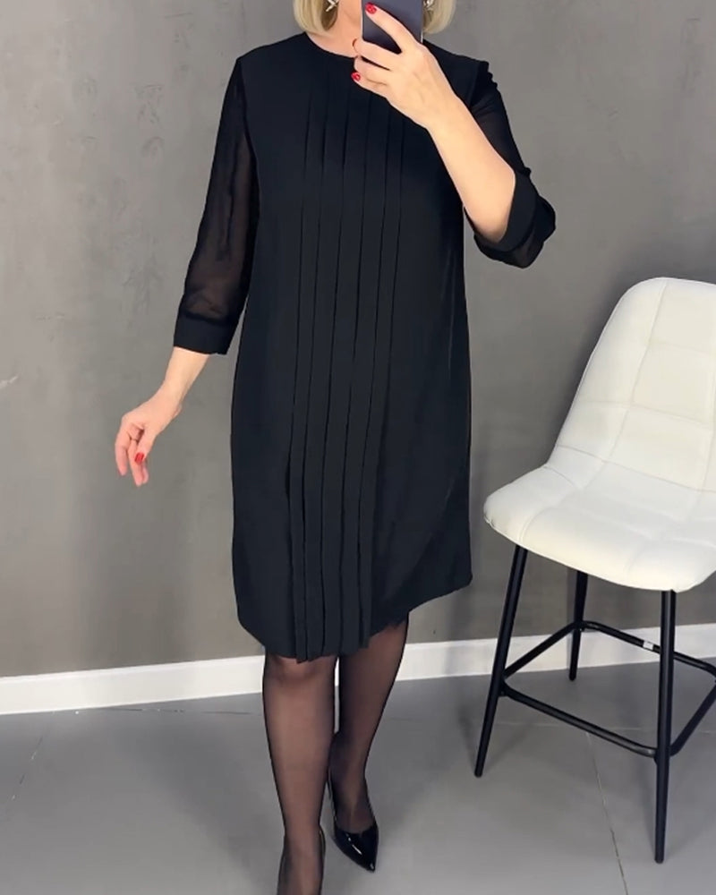 Knee-length women's shift dress, elegant with mesh details, long sleeves, great for office fashion.