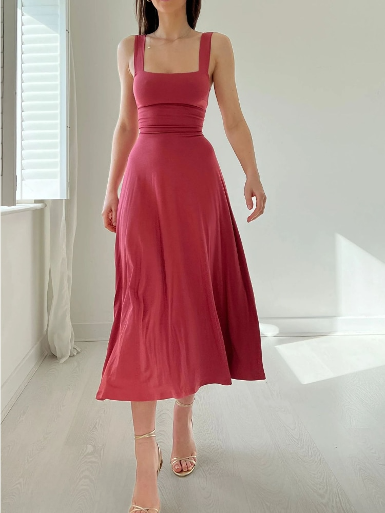 Women's sleeveless A-line midi dress. Elegant, comfortable, and flattering for versatile casual or evening wear.