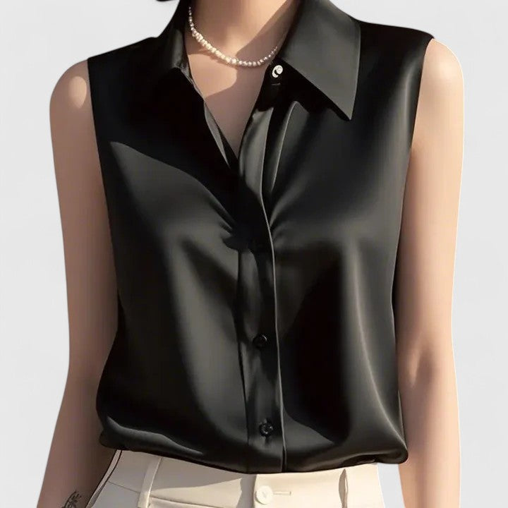 Versatile women's sleeveless blouse, offering casual elegance. A chic, comfortable top for summer or layering.