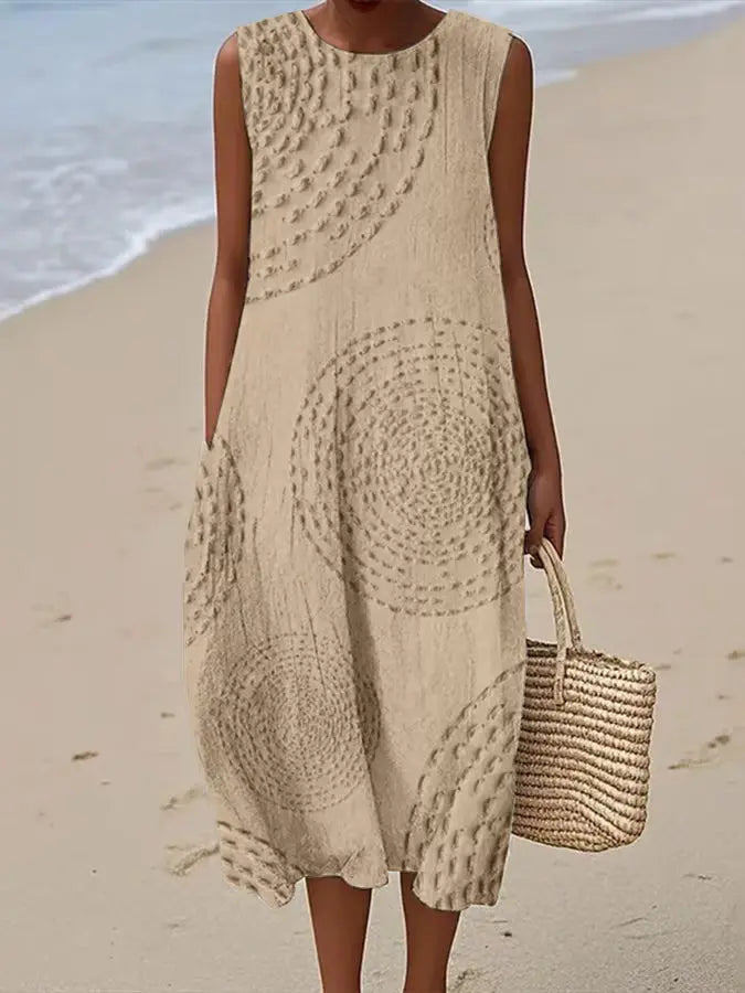 Stylish summer women's midi dress, sleeveless, featuring elegant embroidery and a comfortable flowy design.