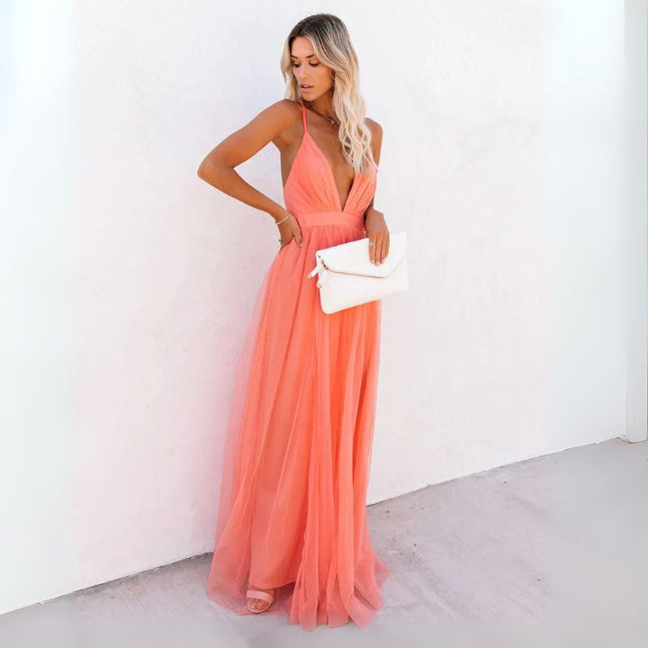 Chic V-neck sleeveless maxi dress for women, suitable as a wedding guest or elegant party dress. Formal wear.