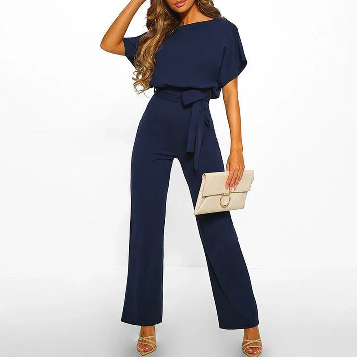 Comfortable women's solid color jumpsuit. An elegant one-piece outfit, great for any stylish occasion.