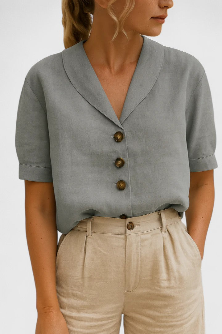Versatile women's sophisticated button-up blouse in a neutral color, lightweight and comfortable for everyday elegance.