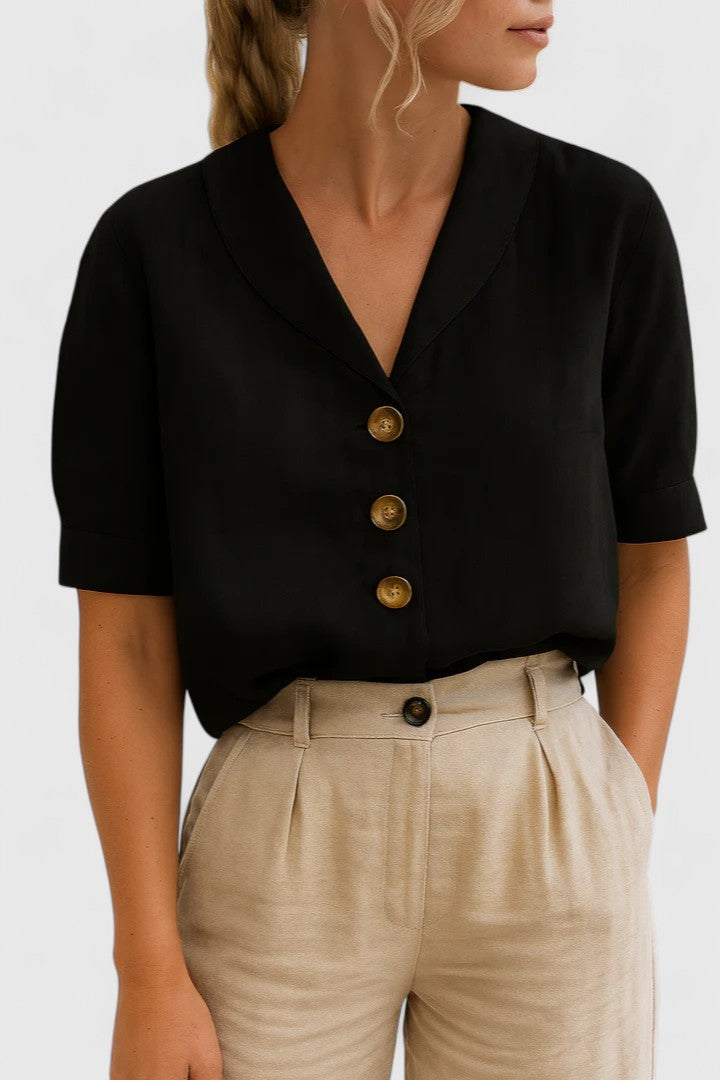 Chic women's button-up blouse for spring & summer. Elegant and versatile, ideal for casual or professional wear.