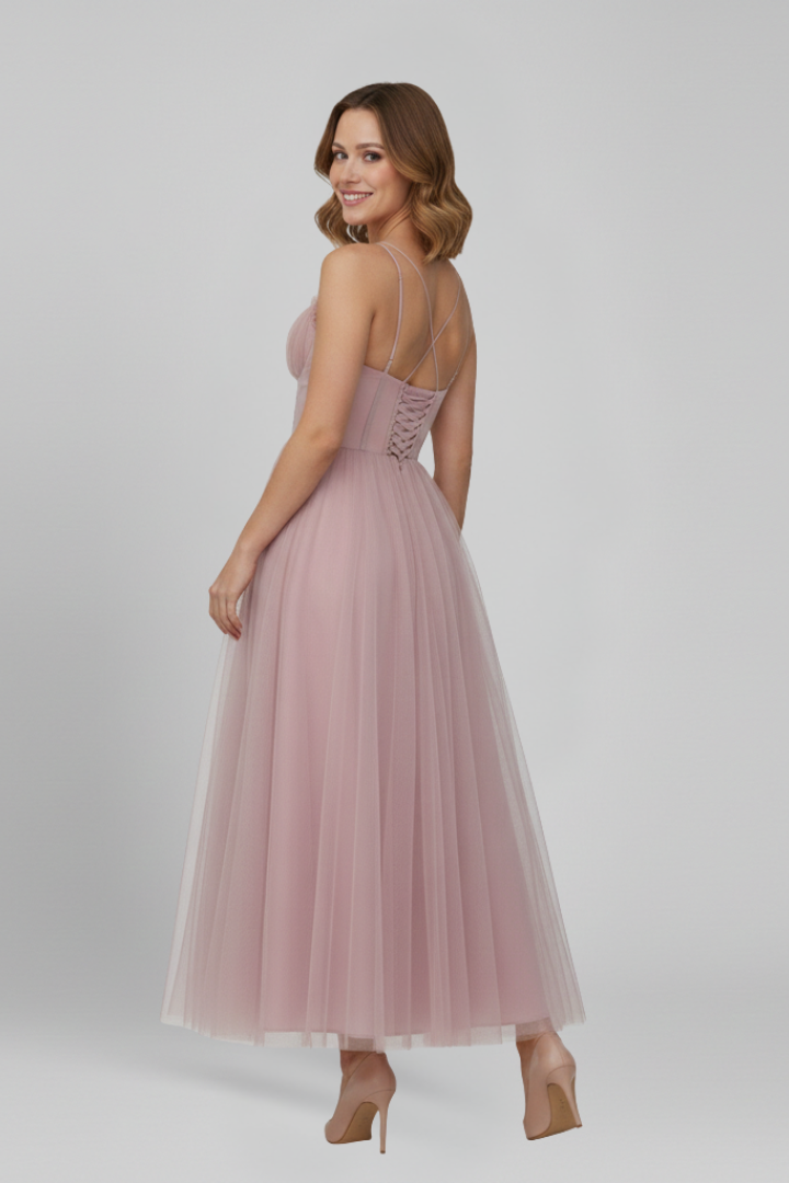 Stylish women's strapless midi dress with elegant layered skirt, ideal for formal or cocktail parties.