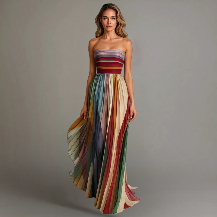Chic women's formal strapless maxi gown featuring bold pleated vertical stripes, ideal for special occasions.
