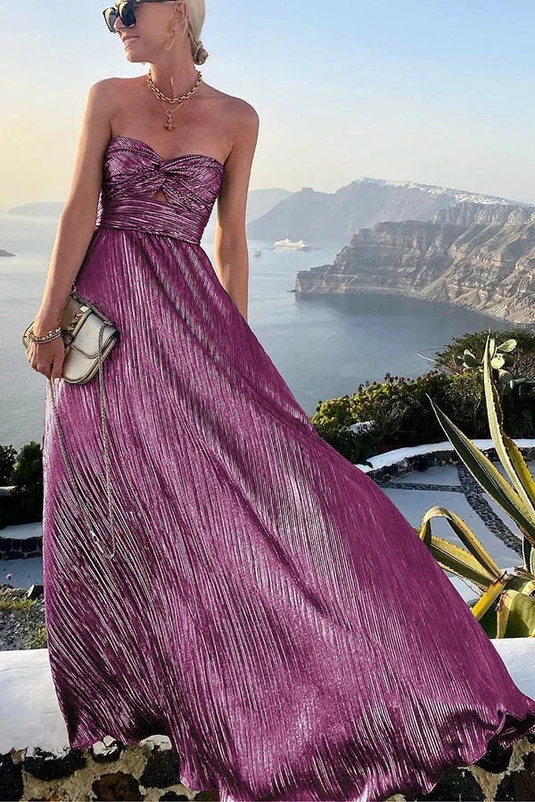 Women's elegant strapless pleated maxi evening dress, a long flowy formal gown for events.