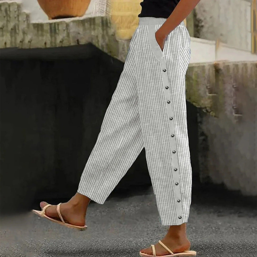 Stylish women's striped high-waist pants with elegant decorative buttons, versatile for spring & summer fashion.