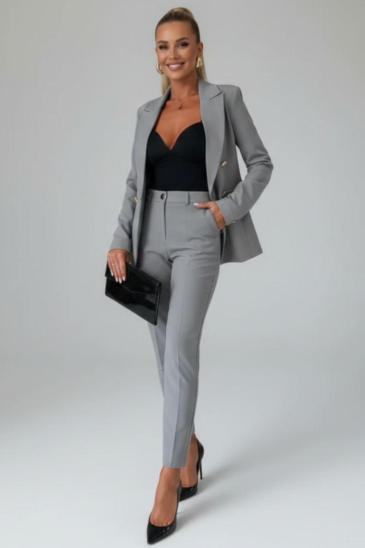 Modern women's tailored suit set, featuring a chic jacket and comfortable straight-leg trousers for work.
