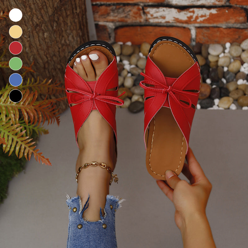 Elegant women's summer sandals with decorative bowknot, perfect for warm weather