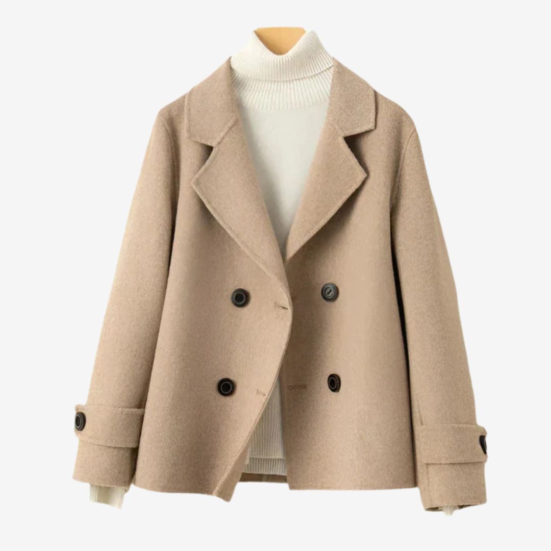 Elegant women's tailored blazer for professional wear. Sophisticated long-sleeve jacket, perfect for office or smart casual.