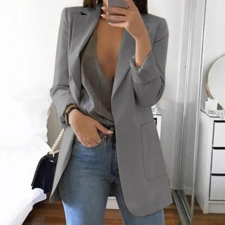 Stylish women's tailored blazer, long sleeve, designed for elegant professional wear and chic office ensembles.