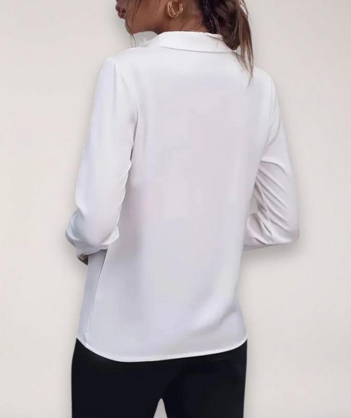 Chic professional women's tailored shirt, ideal for business casual and elegant work attire.