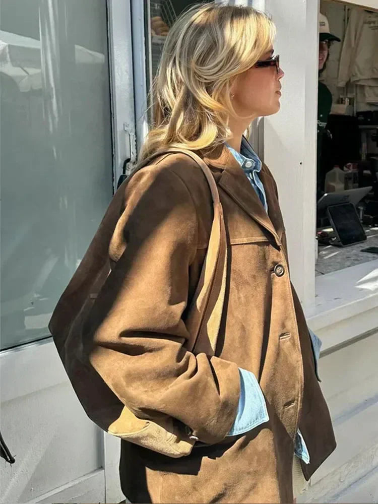 Chic women's fall outerwear. Versatile tailored jacket perfect for elegant autumn style & warmth.