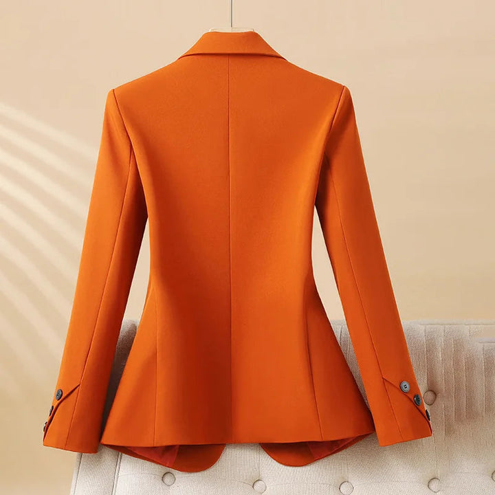 Versatile women's fitted blazer, ideal for professional fashion or casual chic. Tailored long sleeve jacket.