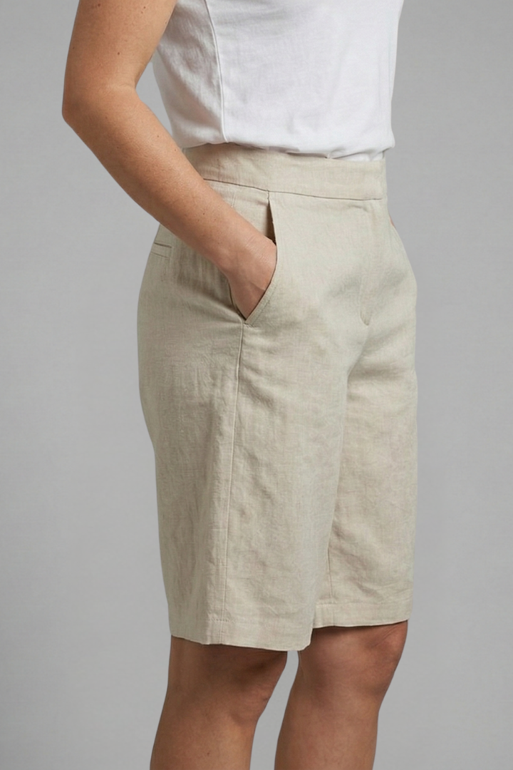 Stylish women's flat front knee-length shorts, tailored for a chic, elegant, & comfortable look.
