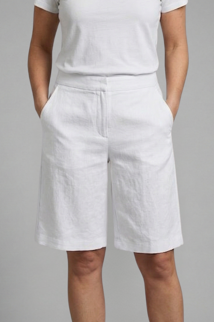 Chic women's tailored flat front shorts, knee-length for an elegant & comfortable summer outfit.