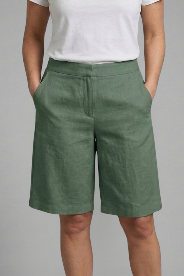 Tailored knee-length shorts for women, flat front, offering a comfortable and elegant summer style.