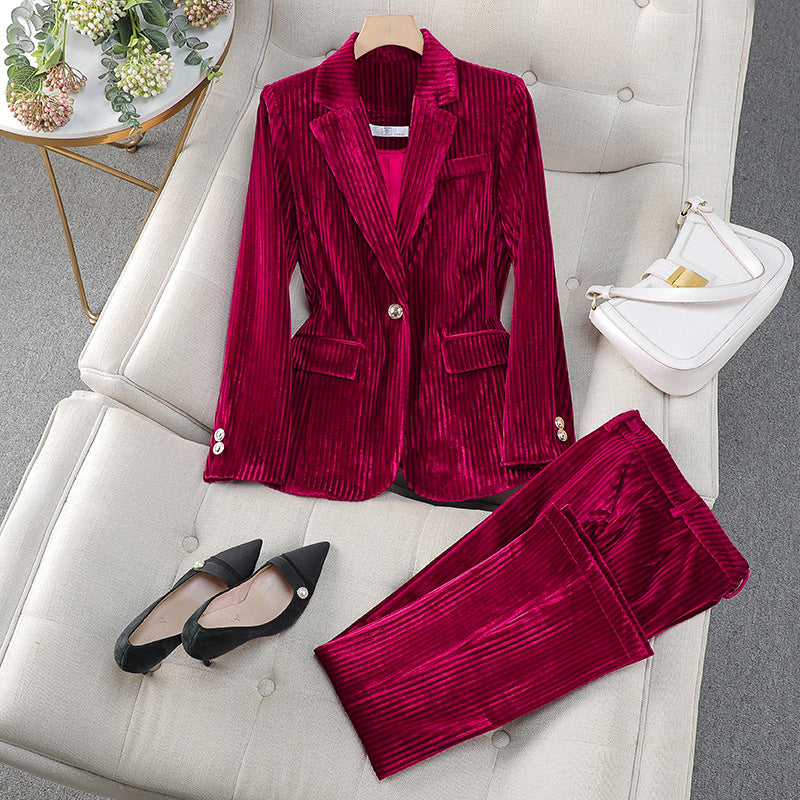 Elegant women's tailored suit set with long blazer, perfect for business casual officewear.