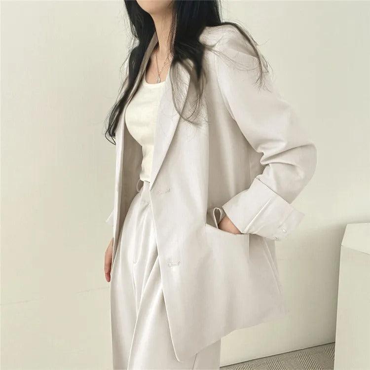 Tailored blazer and trousers, an elegant women's suit set for any formal occasion
