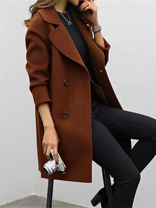 Women's fitted elegant autumn winter coat with a flattering tailored silhouette and chic high collar style.