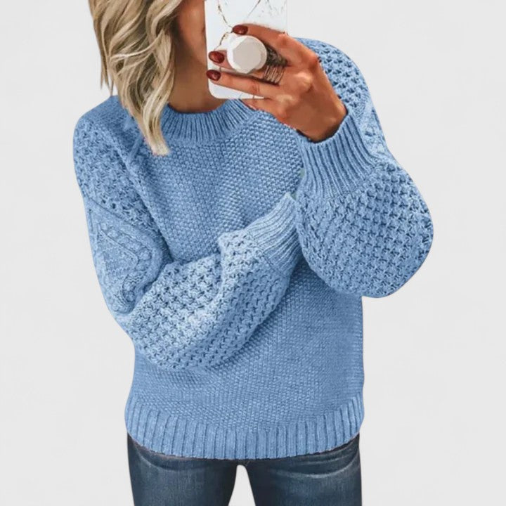 Soft women's textured puff sleeve sweater with mock neck, a comfortable yet elegant top for versatile wear.