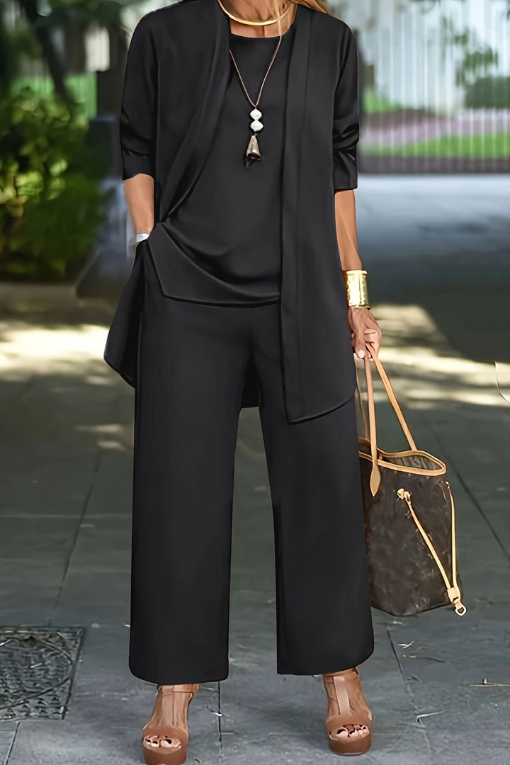 Comfortable women's three-piece lounge set with wide-leg pants & stylish lightweight jacket for relaxed wear.