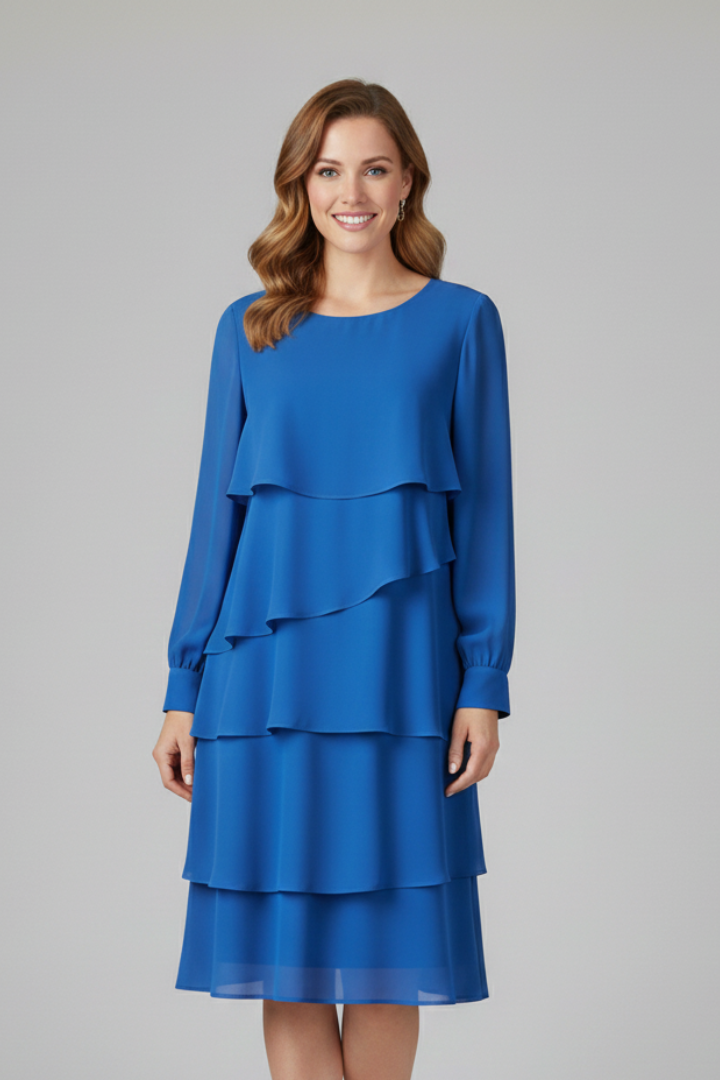 Beautiful tiered long sleeve dress for women, offering a flowing silhouette and chic knee-length style.