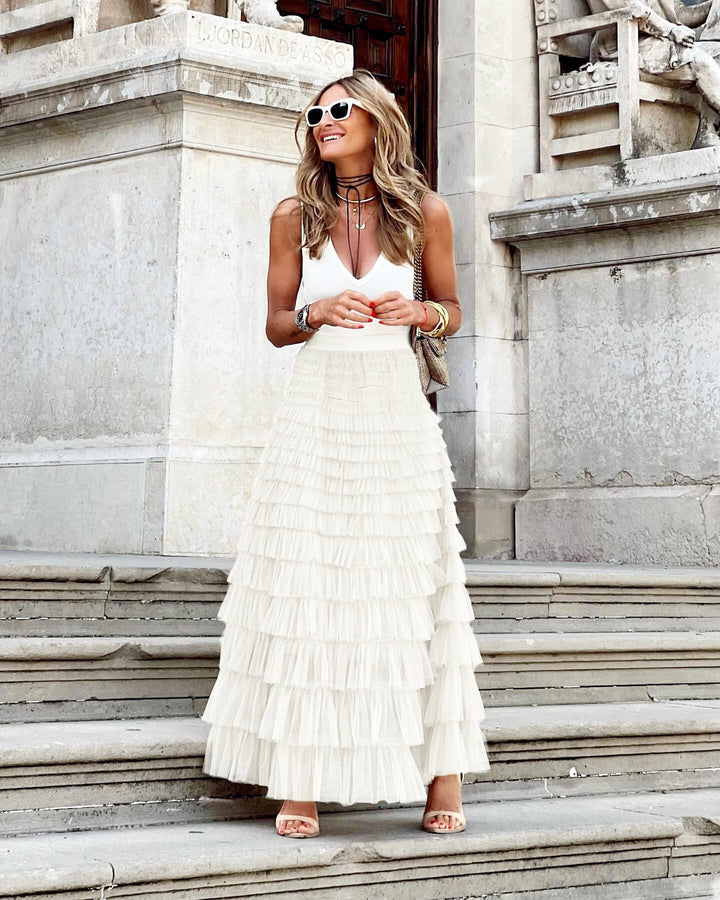 Long tiered maxi skirt for women with cascading ruffled layers, suitable for special occasions.