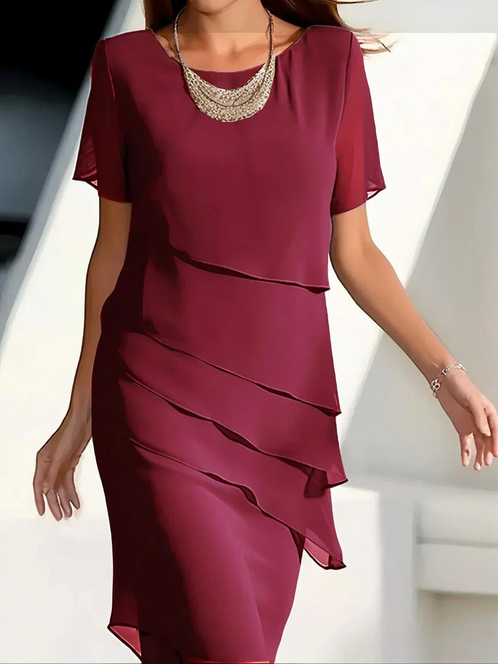Chic women's tiered ruffle midi dress with flowy design, ideal for casual outings, events, and summer fashion.