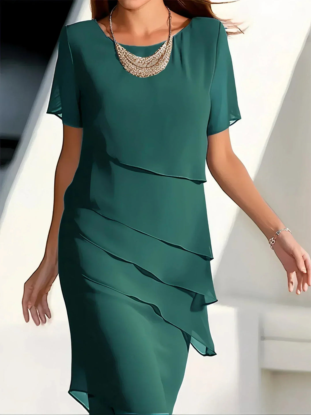 Beautiful women's tiered ruffle midi dress, featuring a flattering silhouette and elegant style for any occasion.