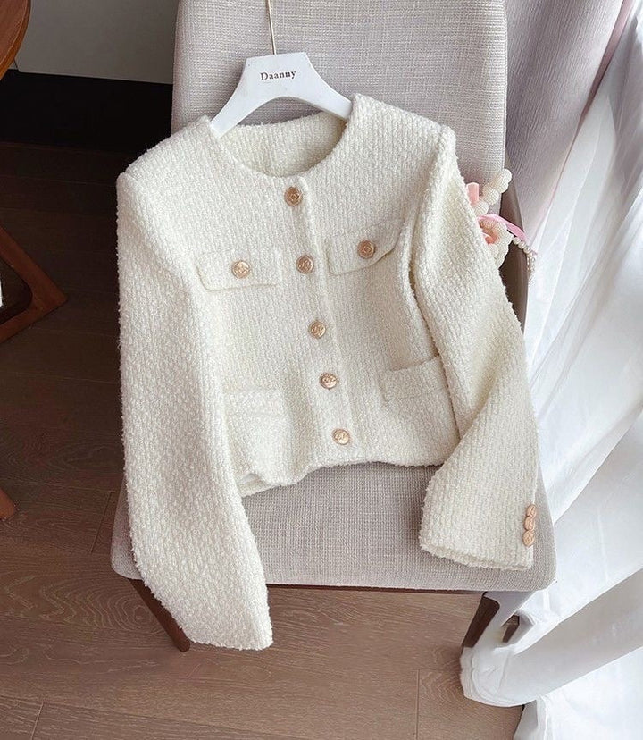 Chic women's tweed jacket, round neck design, sophisticated and versatile for modern ladies' fashion.
